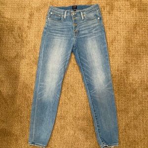 High rise light wash button fly jeans